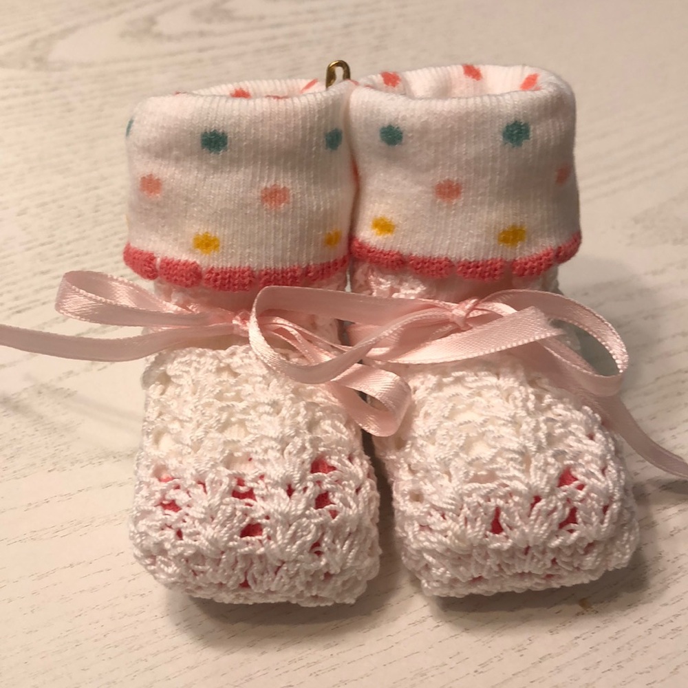 Homemade crochet baby booties